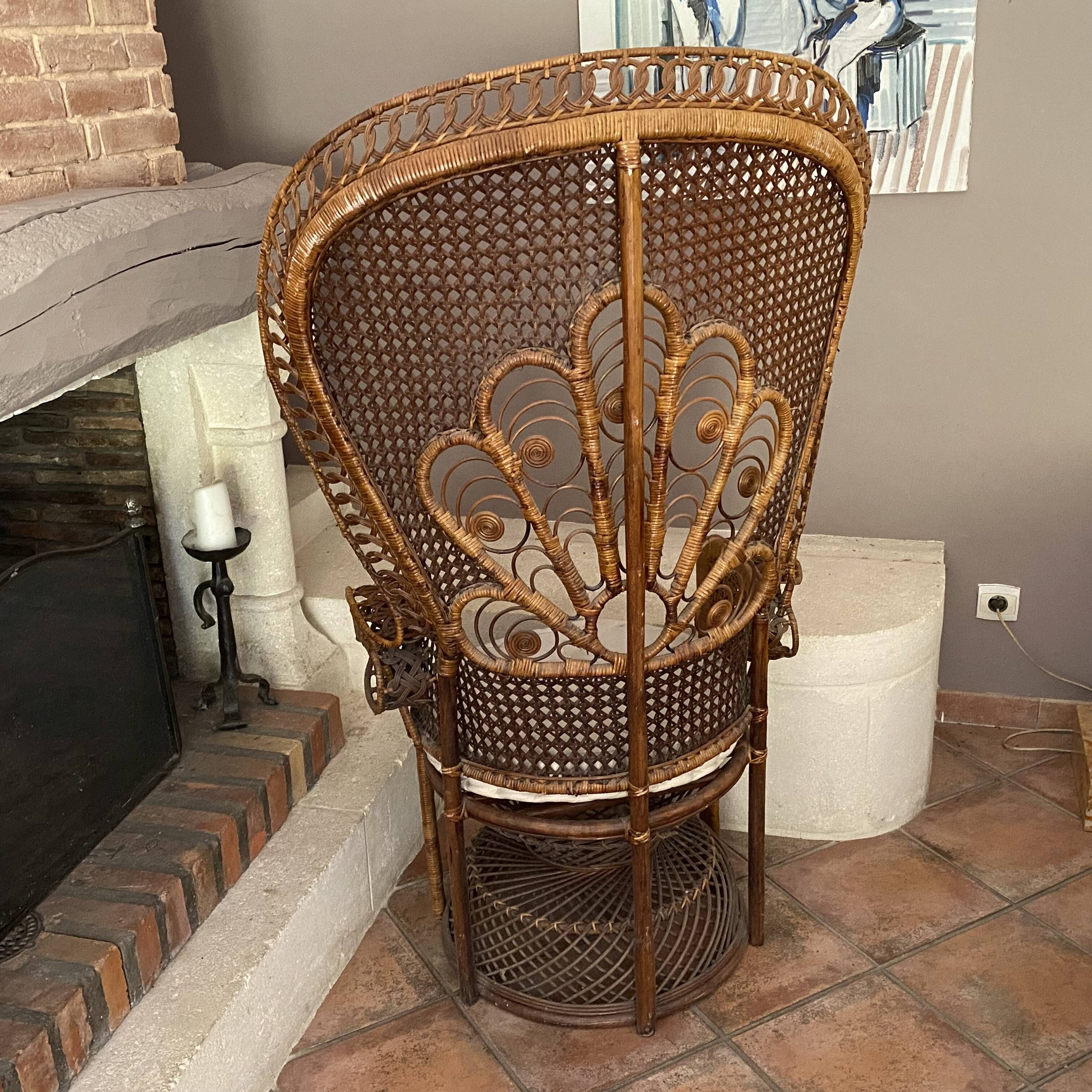 Large Emmanuelle rattan armchair. 1970.