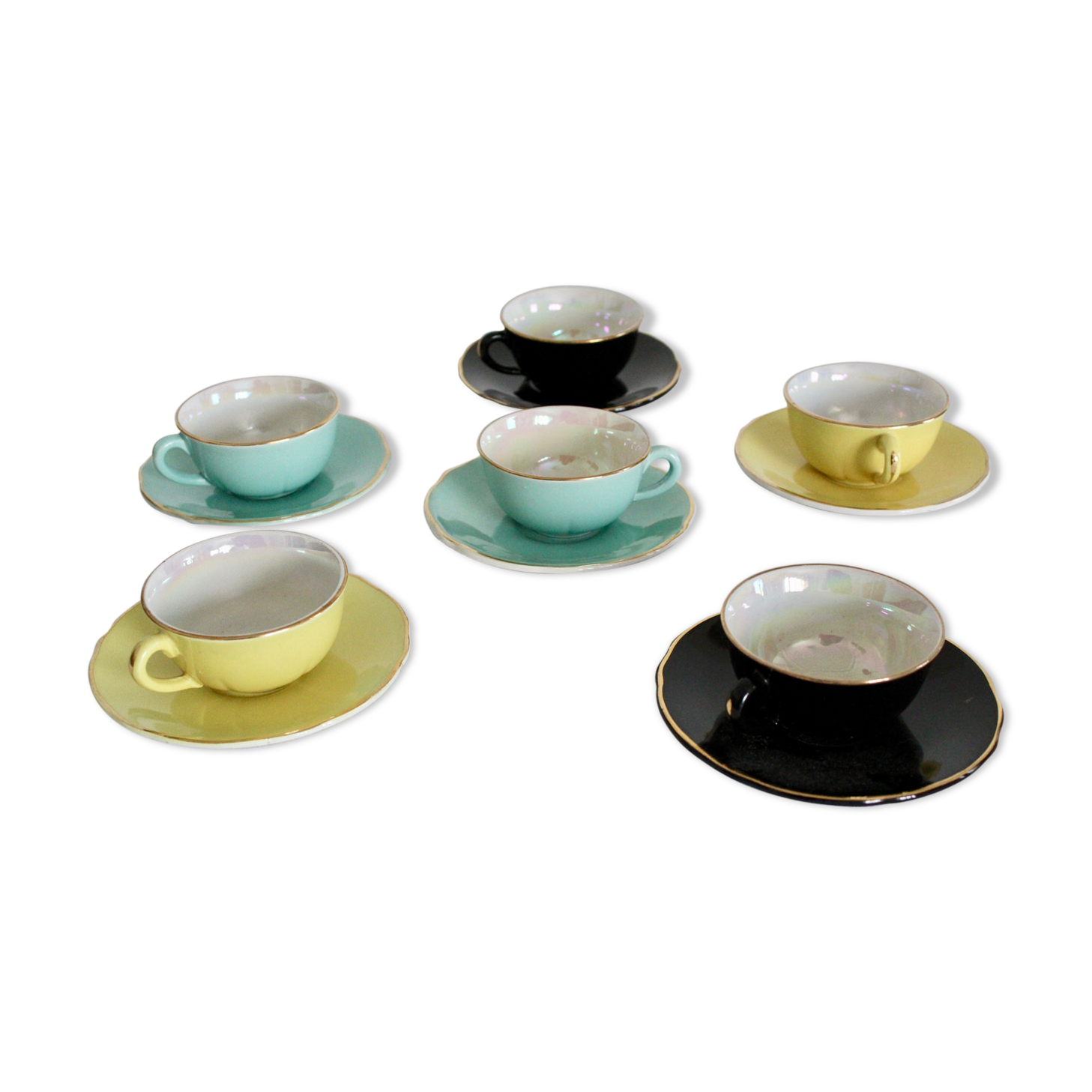 6 multicolored cups and saucers, pearly interior