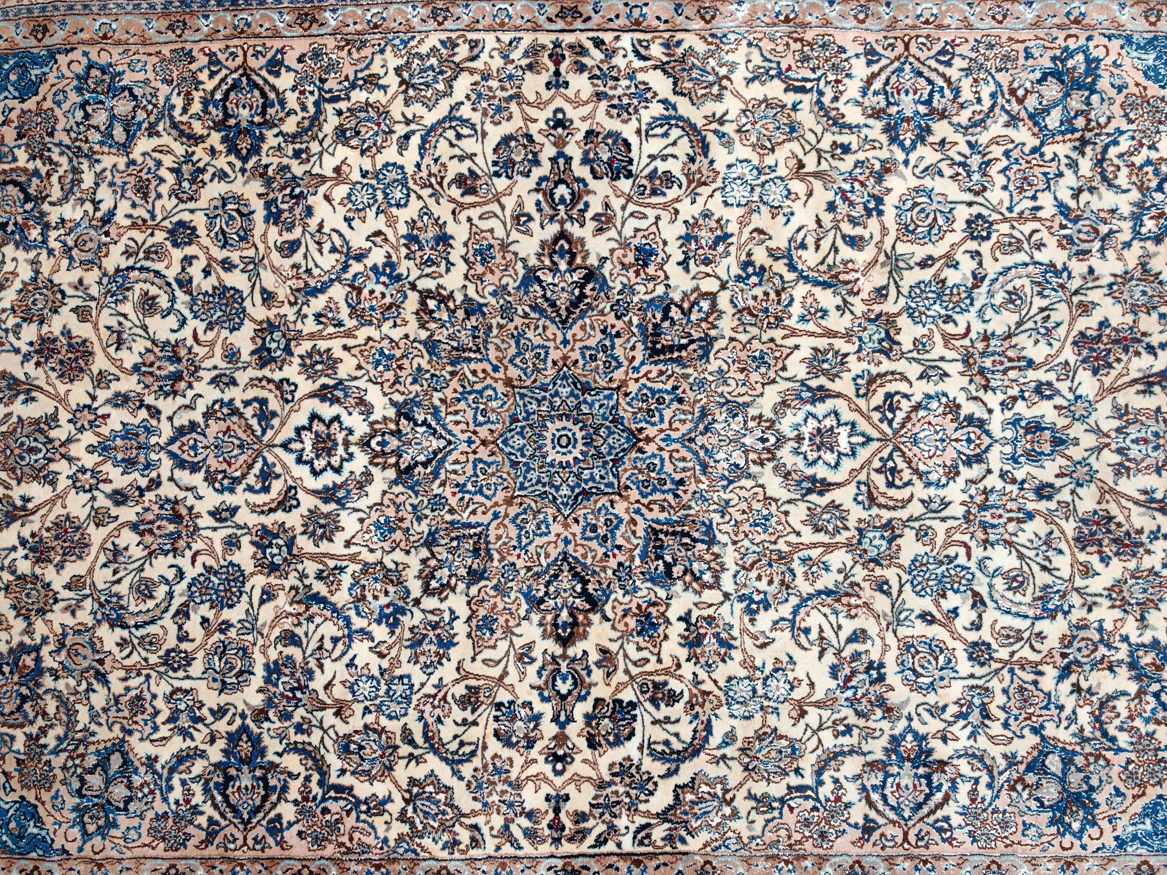 Vintage Persian Nain carpet, handwoven wool and silk from the 1940s.