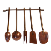 Vintage copper and brass kitchen utensils.