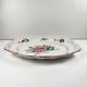 Oval flat dish with flat ends, Réverbère model by KG Lunéville, rose pattern.