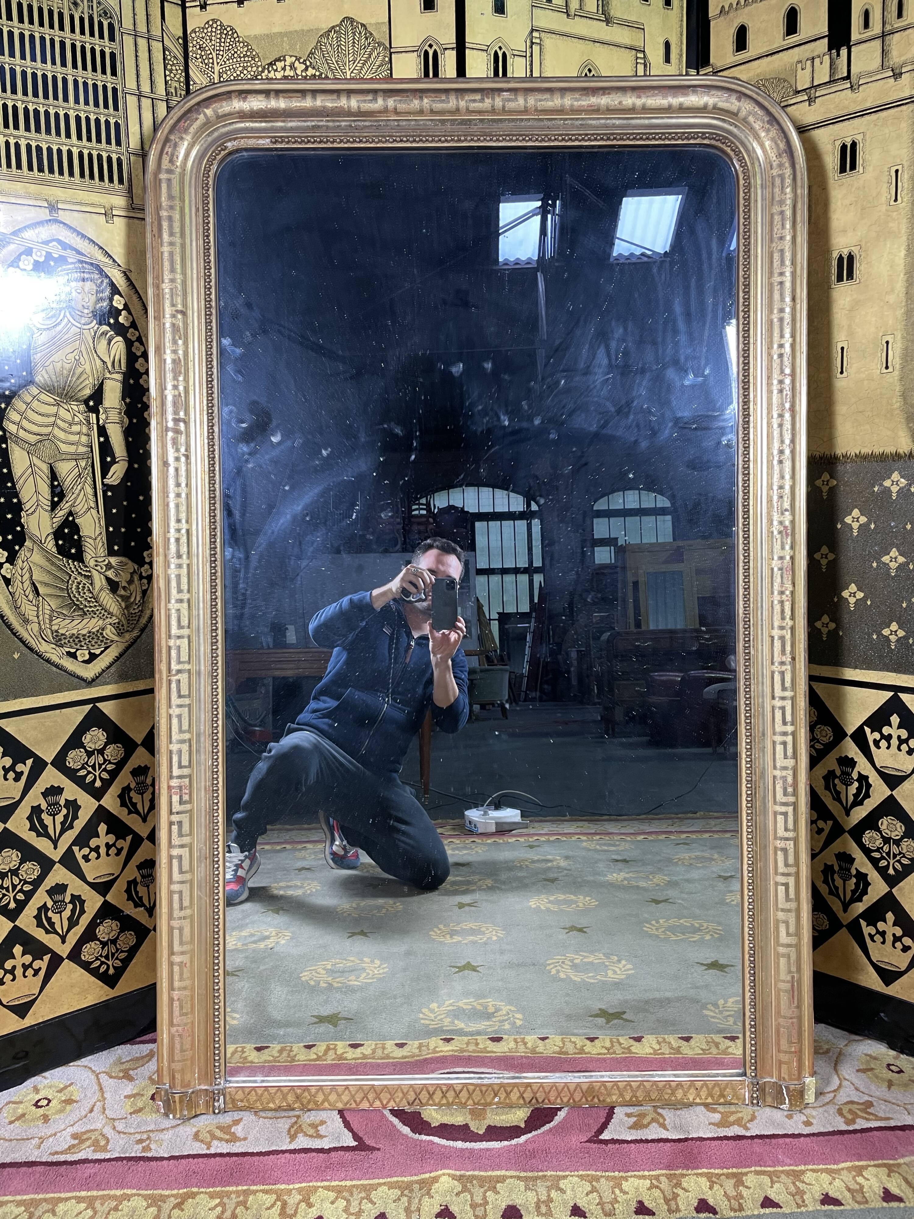 Louis Philippe period mirror with gold leaf