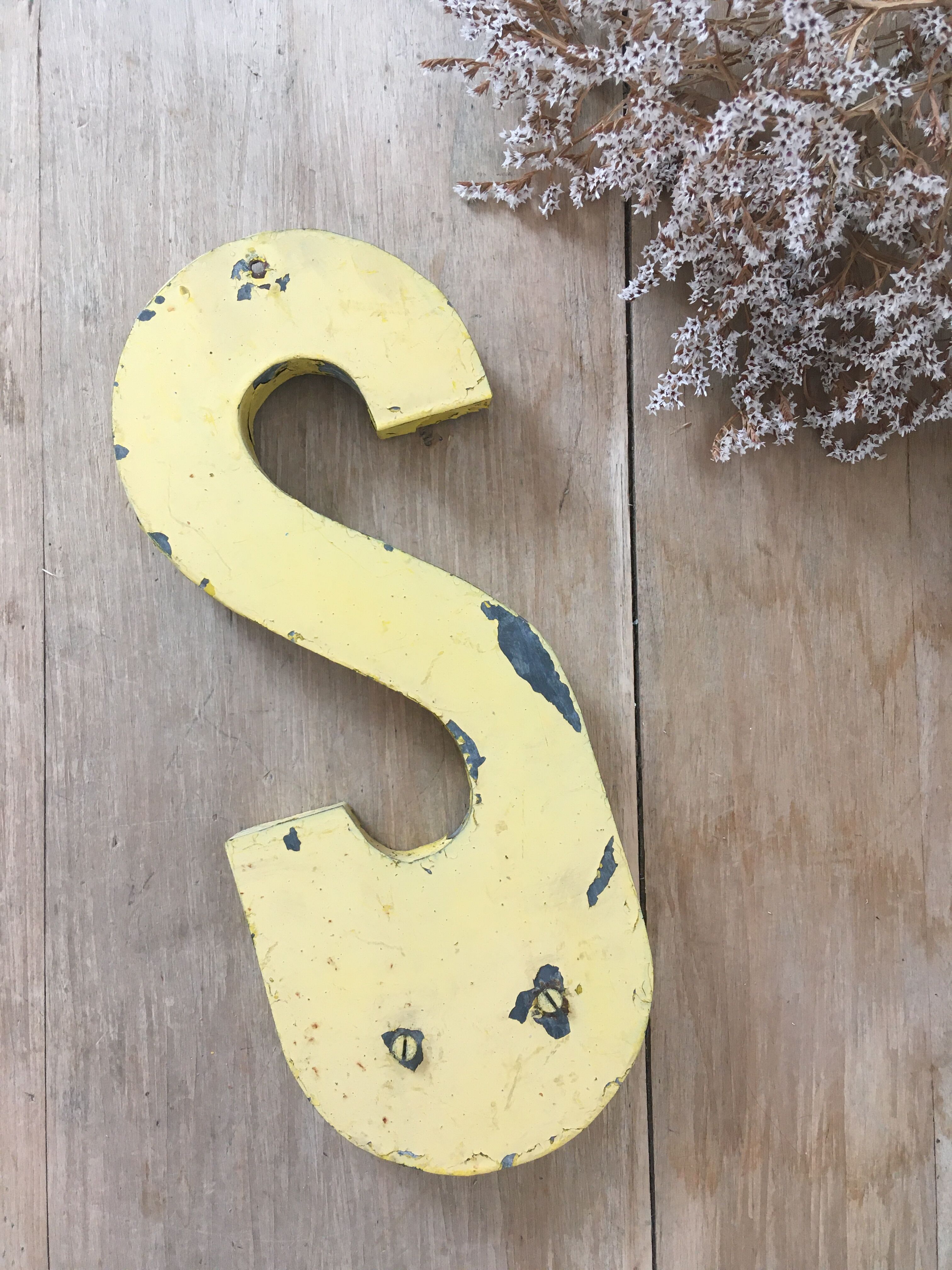 Vintage yellow sign letter S