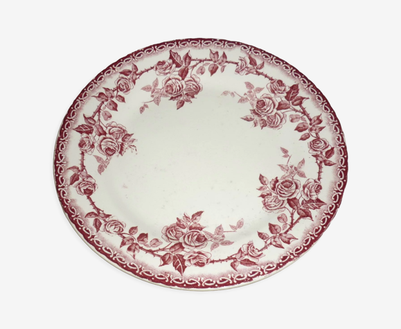 Assiette en faïence beige avec décor de roses et guirlandes rouges