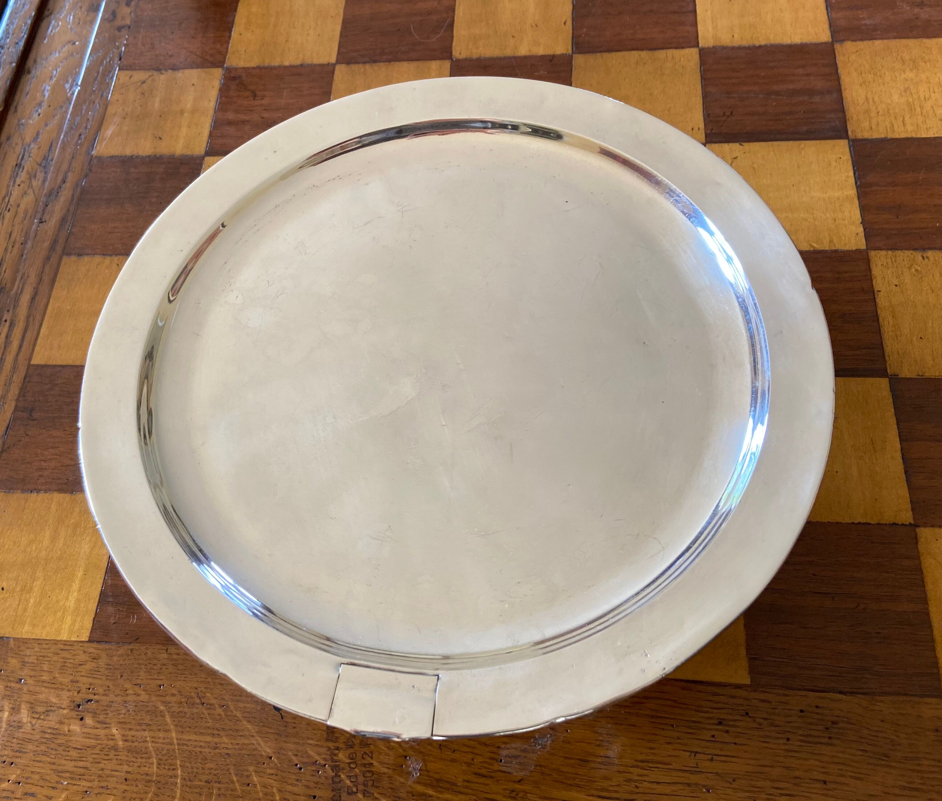 Old silver metal trivet