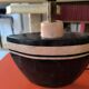 Table lamp in black and pink stone marquetry with a silk shade.