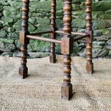 High stool in turned wood