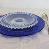 Vintage service of 12 pressed glass plates with bead decoration.