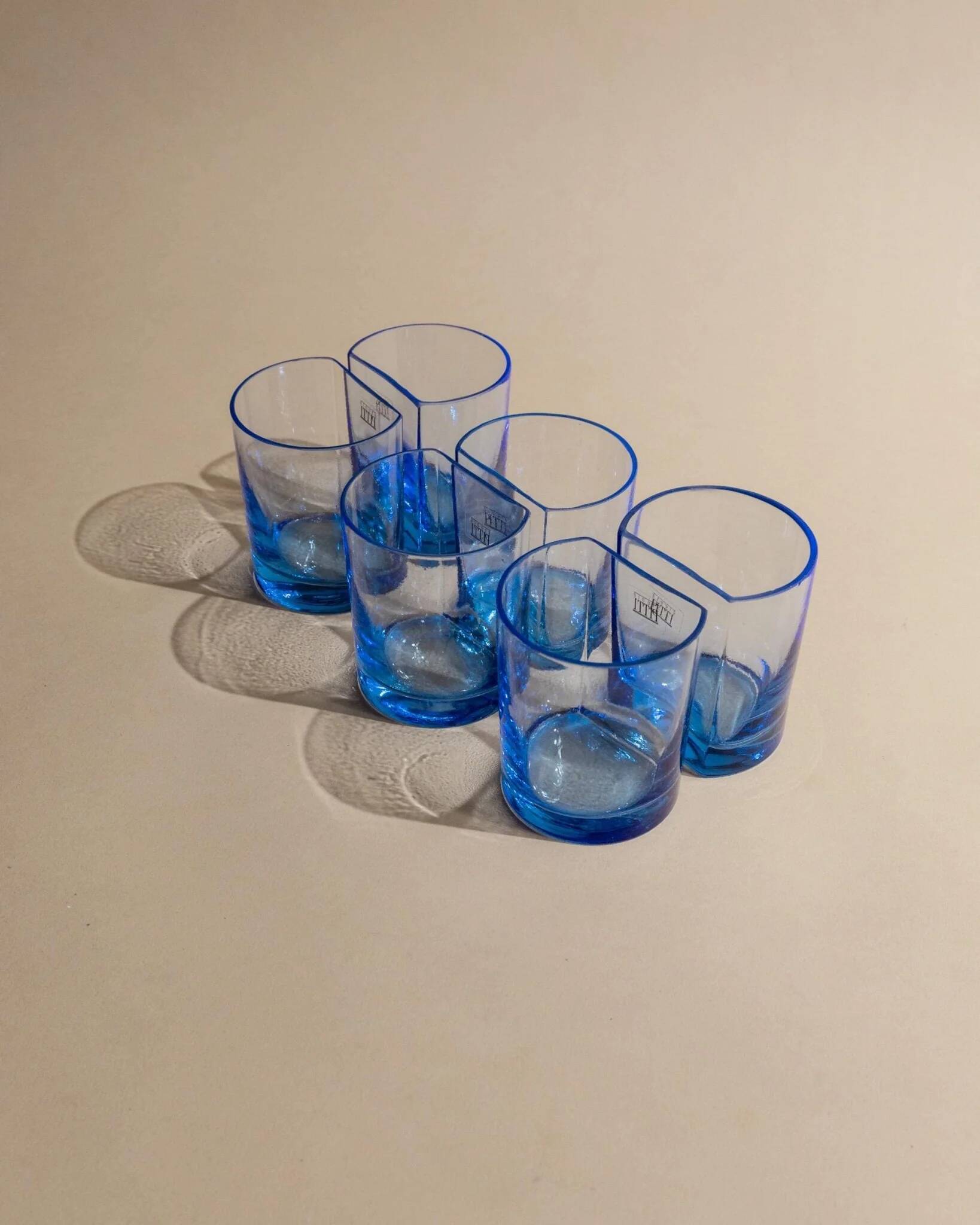Set of 6 vintage blue drinking glasses with curved design, Pitti Studio, Italy, 1980s.