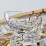 Set of 8 champagne glasses in carved blown glass