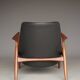 Seal armchair in leather and teak by Ib Kofod-Larsen for OPE, Sweden, 1960s.