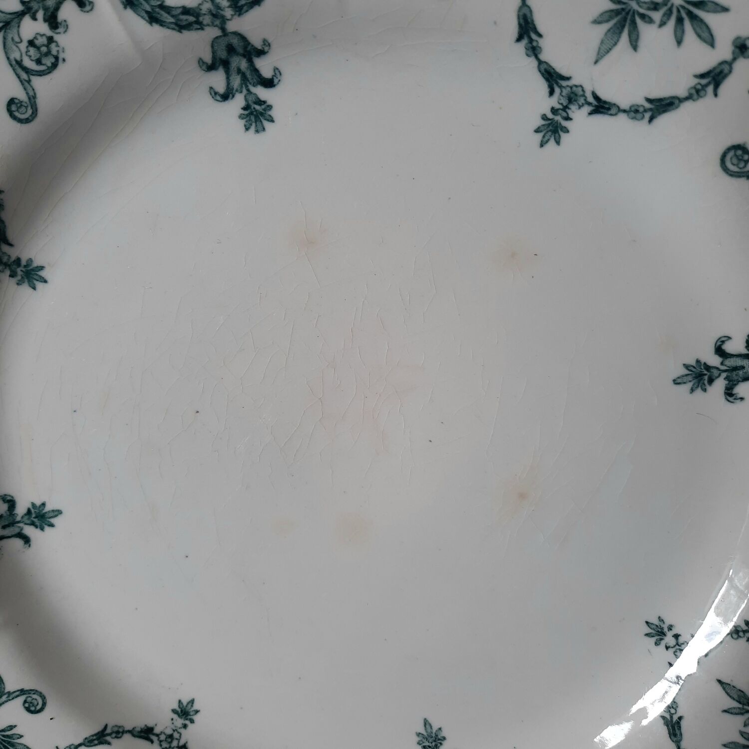 Old dessert plates mismatched in iron earth