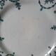 Old dessert plates mismatched in iron earth
