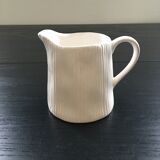 White pitcher streaked in relief