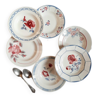 Mismatched old soup plates accompanied by a soup tureen
