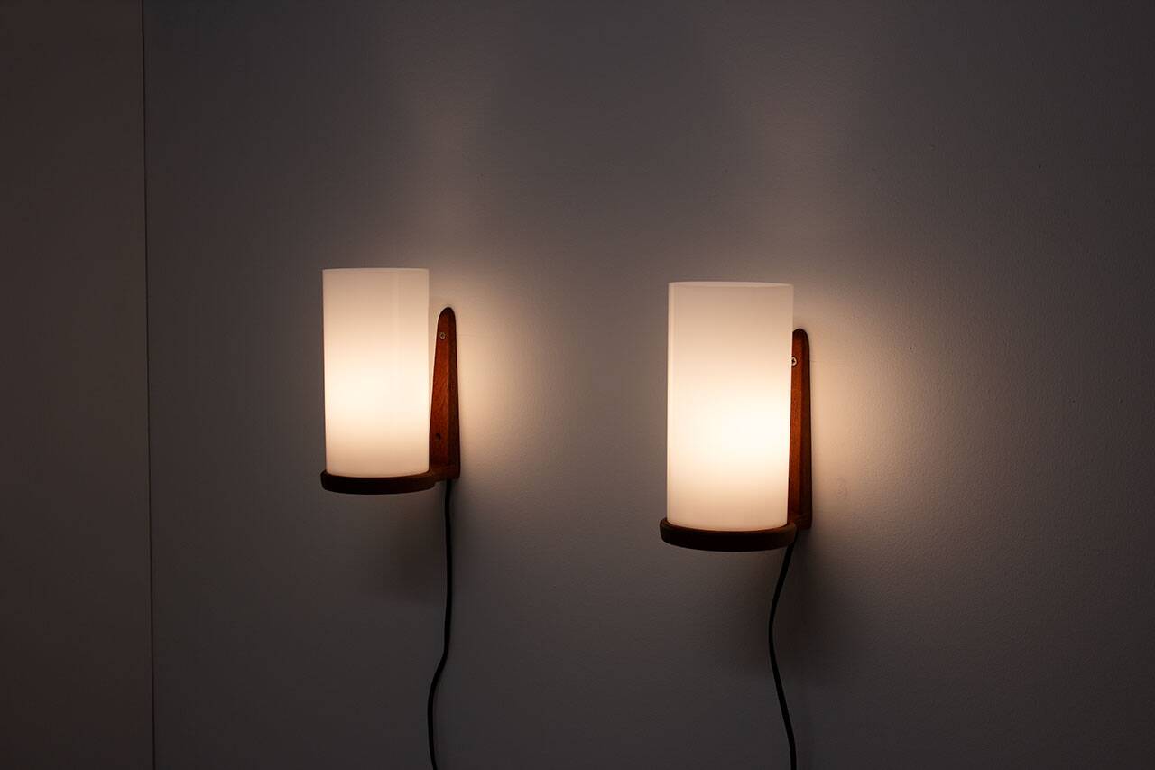 Pair of teak & acrylic sconces by Luxus, Sweden