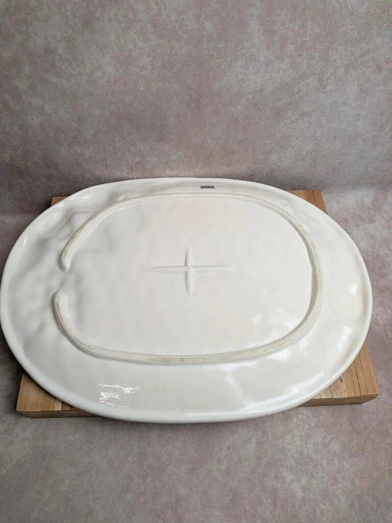 Vintage oval serving dish in majolica – Relief fruit decoration and woven basket design.