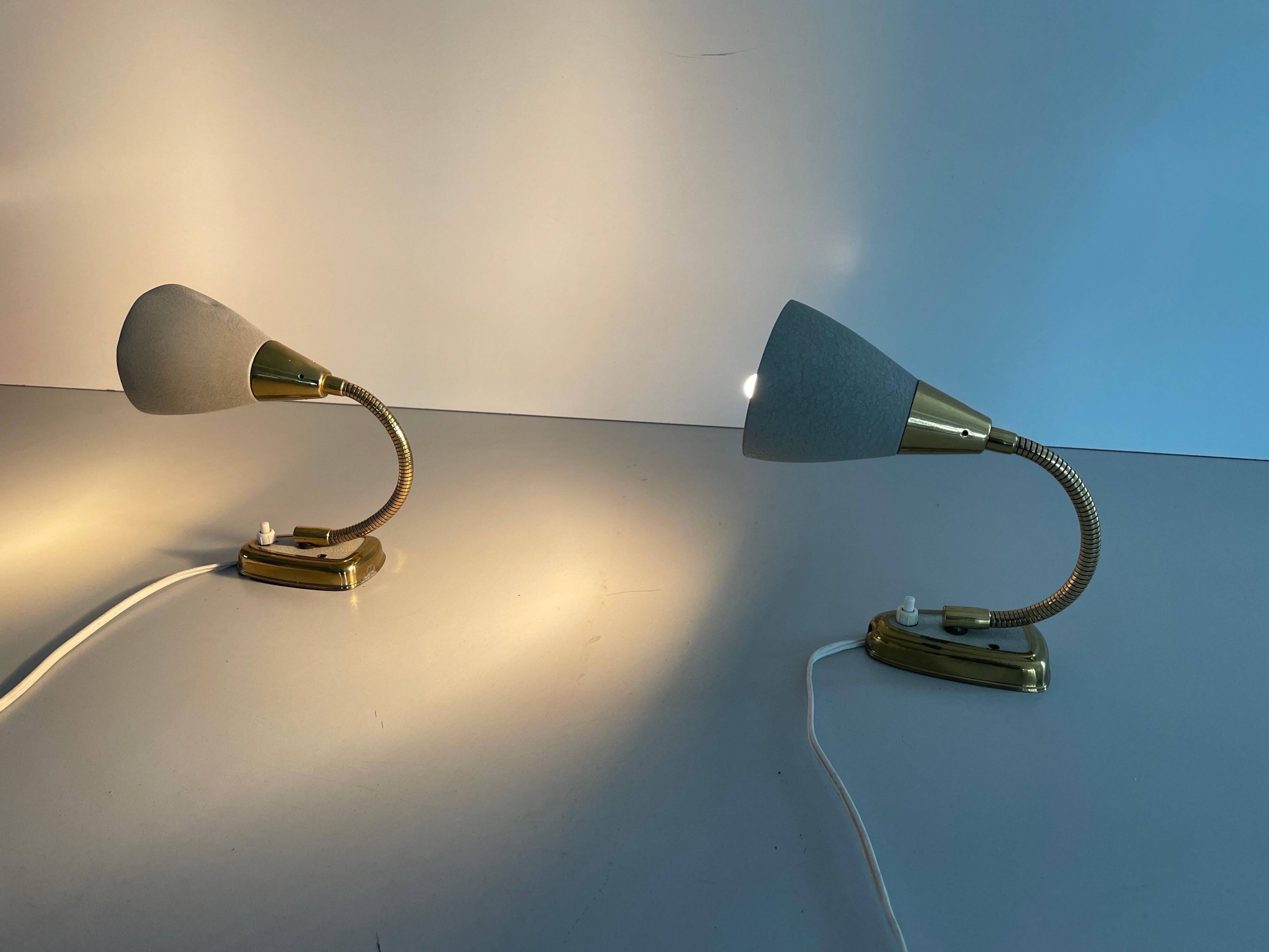 Pair of grey metal and brass wall lights, 1960s, Germany