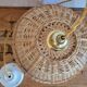 Openwork rattan suspension