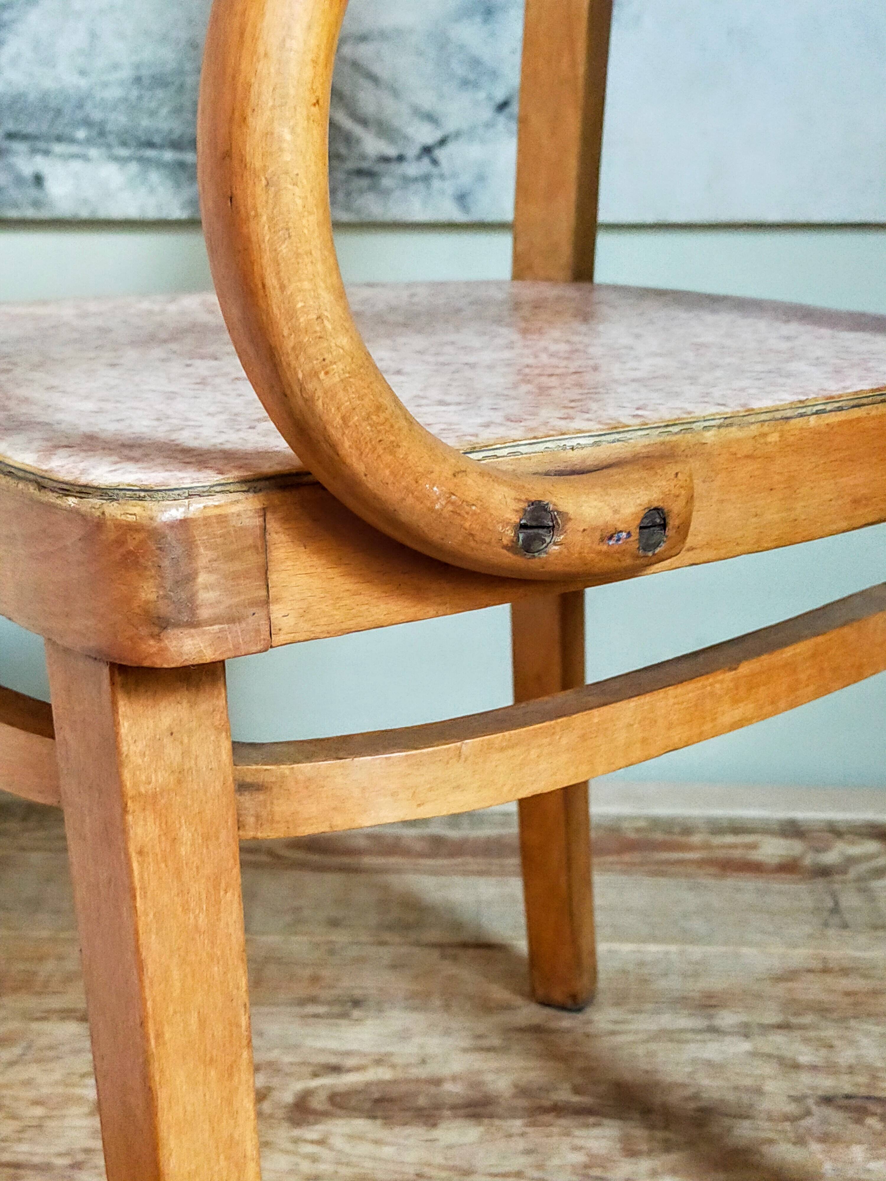 Children's armchair in old bent wood