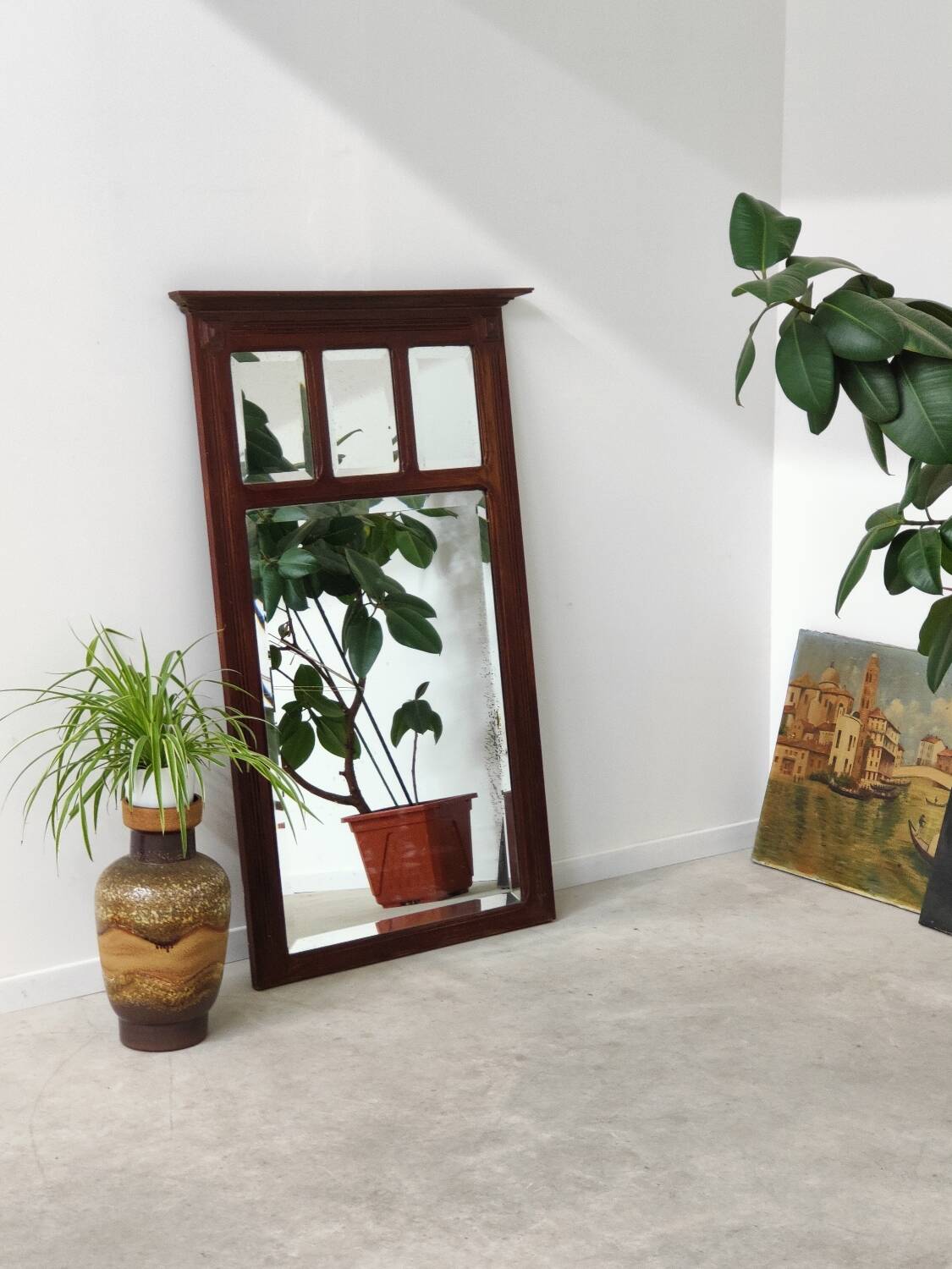 Antique beveled mirror on a wooden frame, 1930