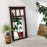 Antique beveled mirror on a wooden frame, 1930