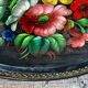 Black lacquered metal tray with multicoloured vintage Russian floral decoration.