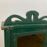 Wall vitrin with pediment