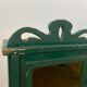 Wall vitrin with pediment