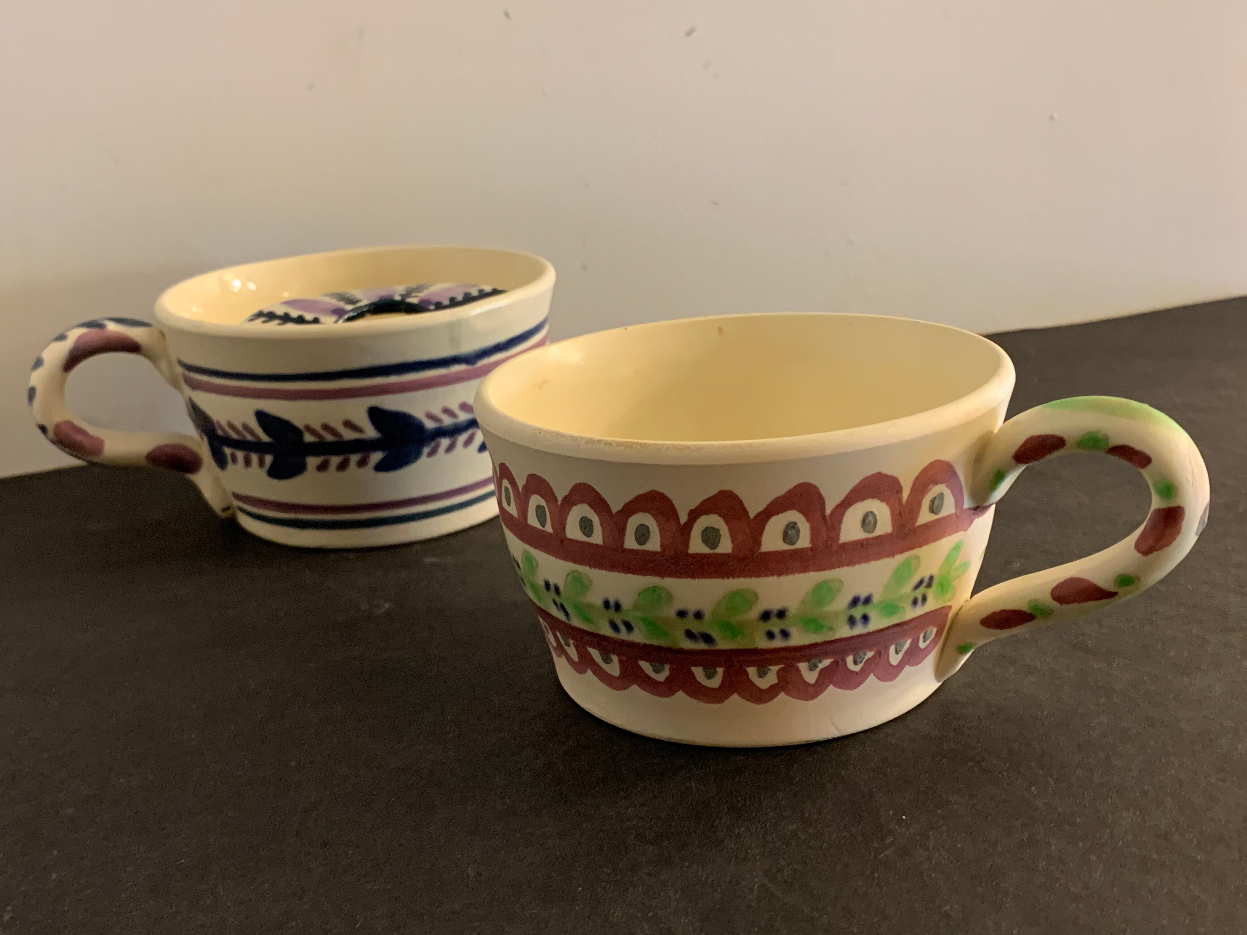 Pair of ceramic cups including a mustache cup for gentleman