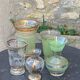Set of 5 vases in green granite glass and vintage gold