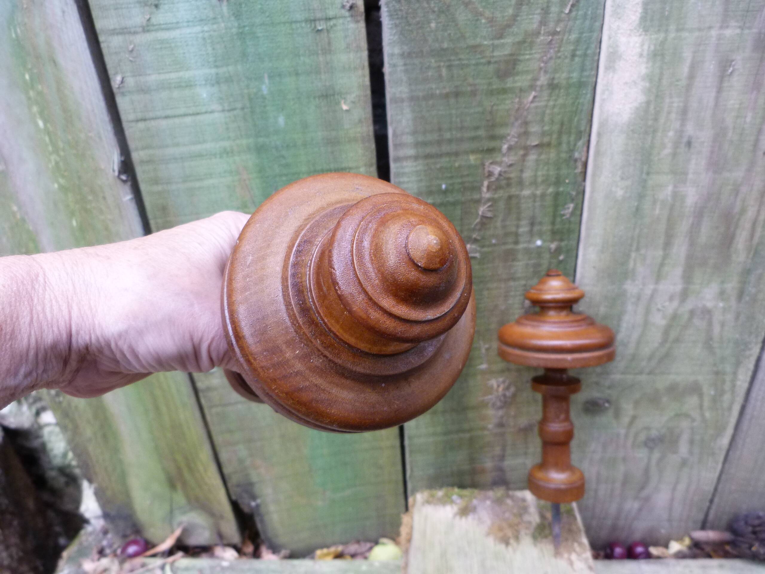 Pair of old turned wood pieces for curtain tieback finishes