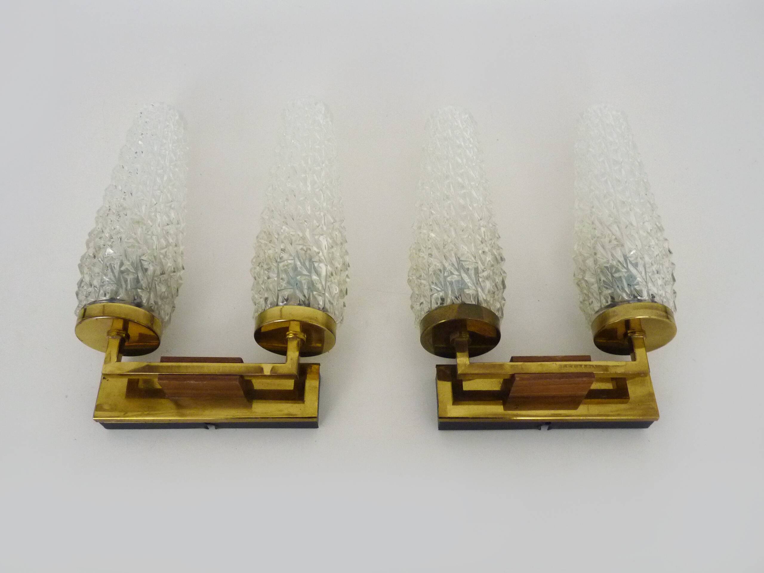 Pair of double-light wall lights, brass, teak globe, glass tubes. 50s-60s