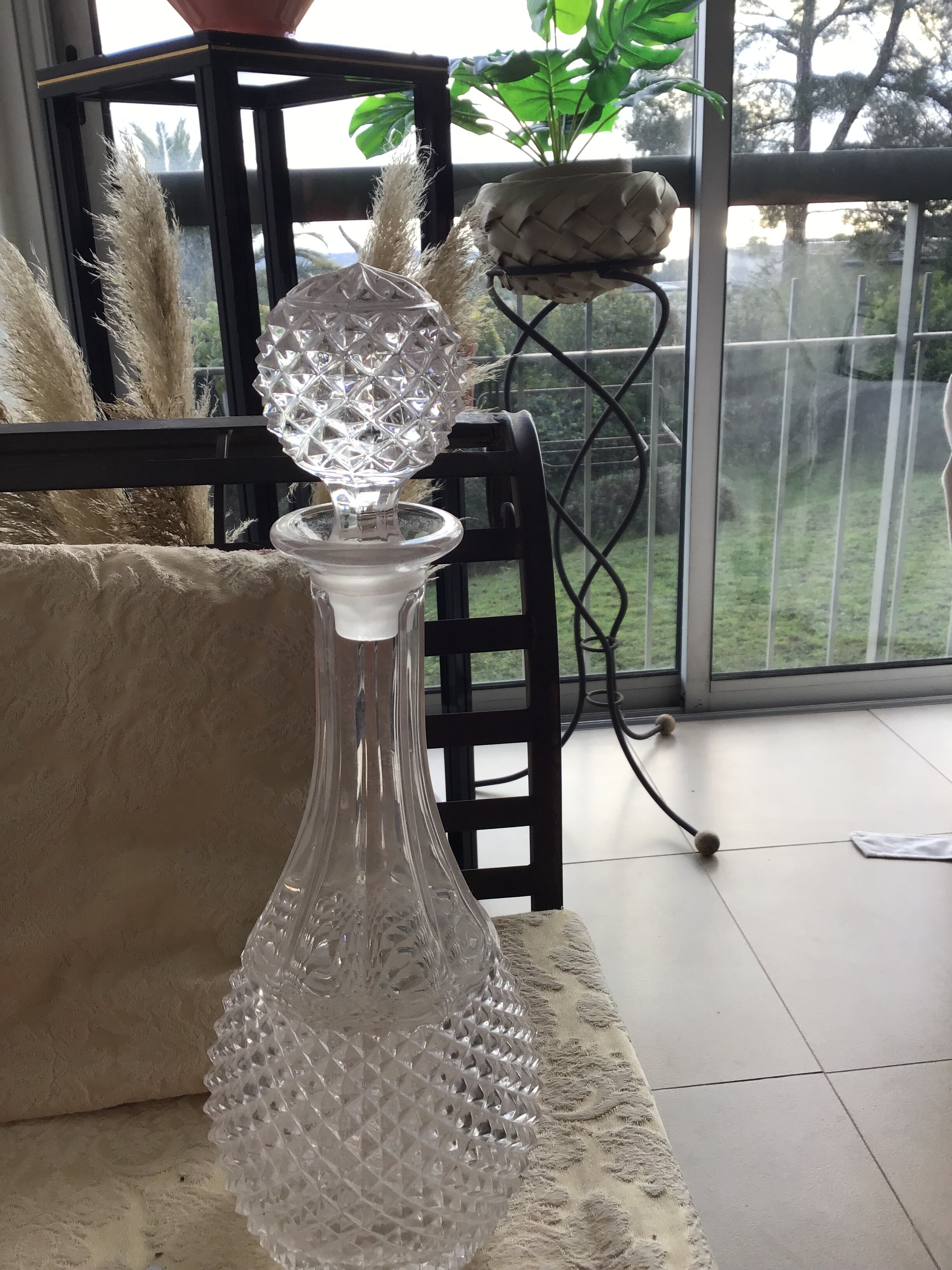 Crystal and glass wine decanter