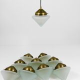 Up to 7 Art Deco brass pendant lights with conical glass shades, Vienna 1930s.
