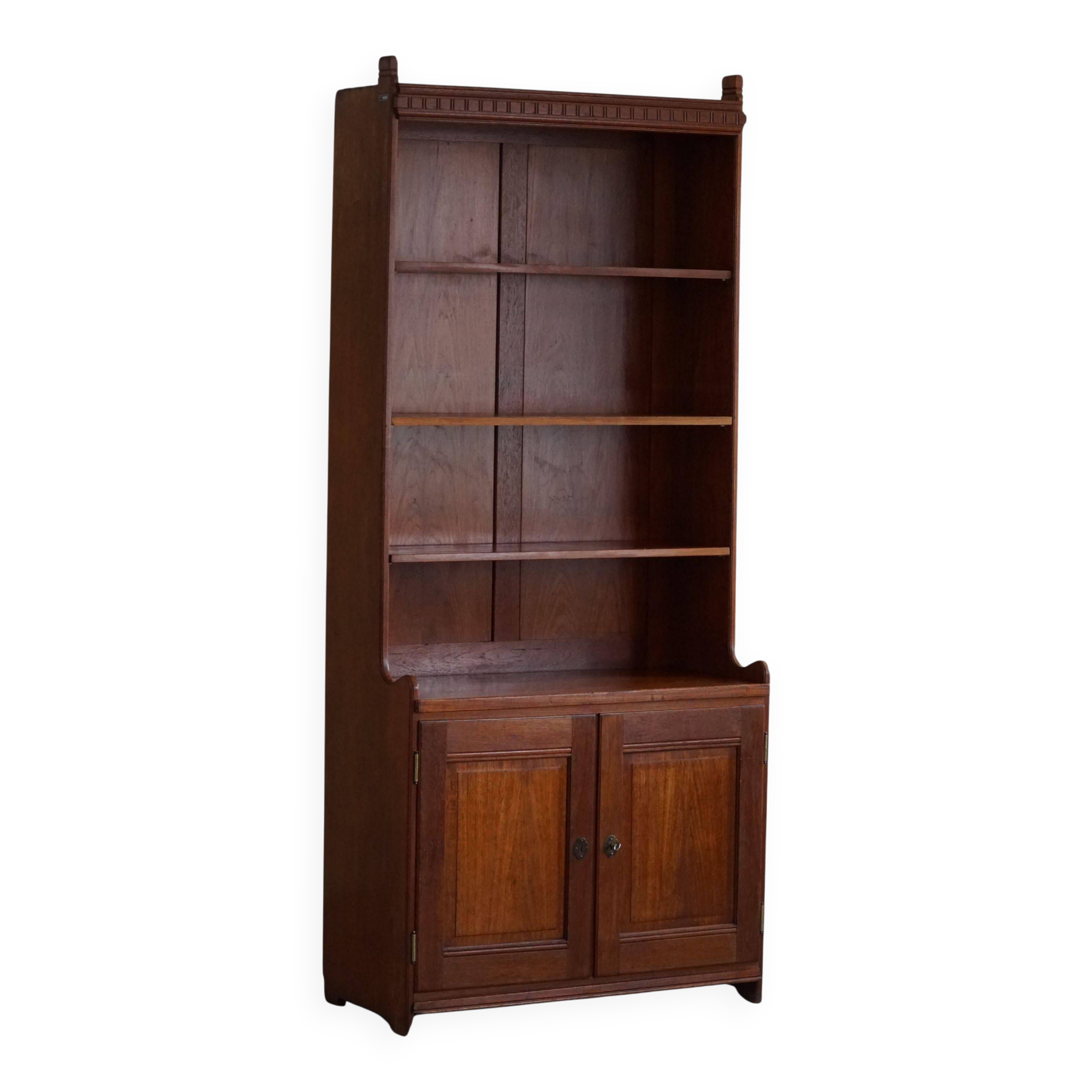 Rare high cabinet in teak by Martin Nyrop for Rud. Rasmussen, Denmark, early 20th century.