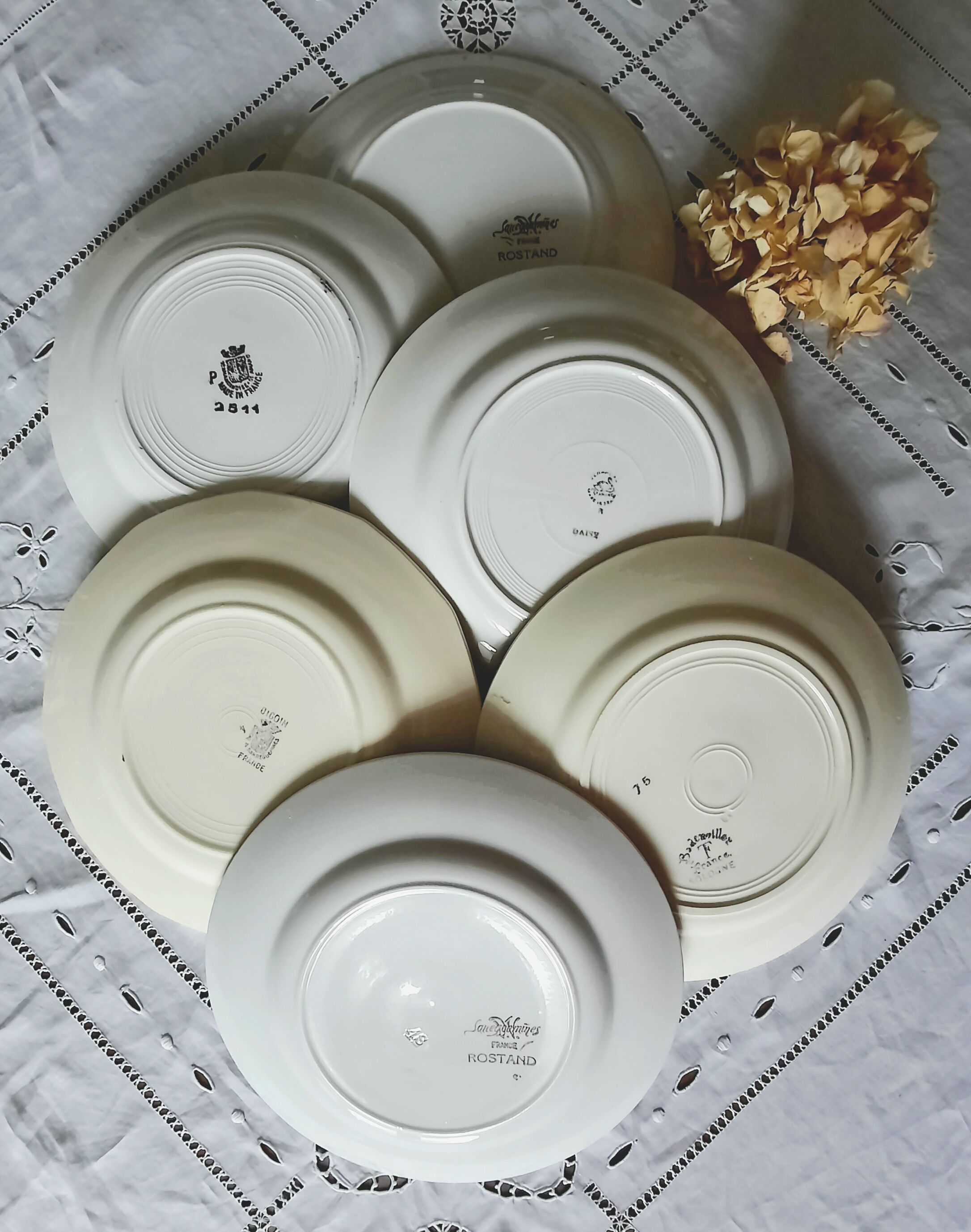 Old flat plates mismatched in earthenware