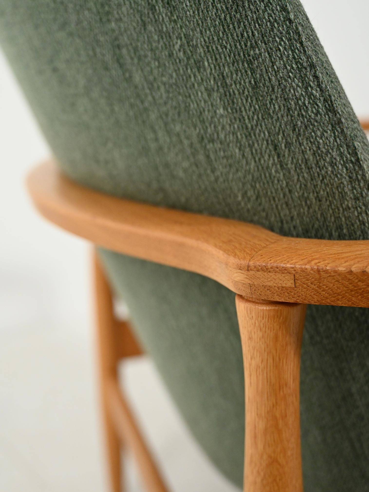 Scandinavian oak and sage-green wool armchair