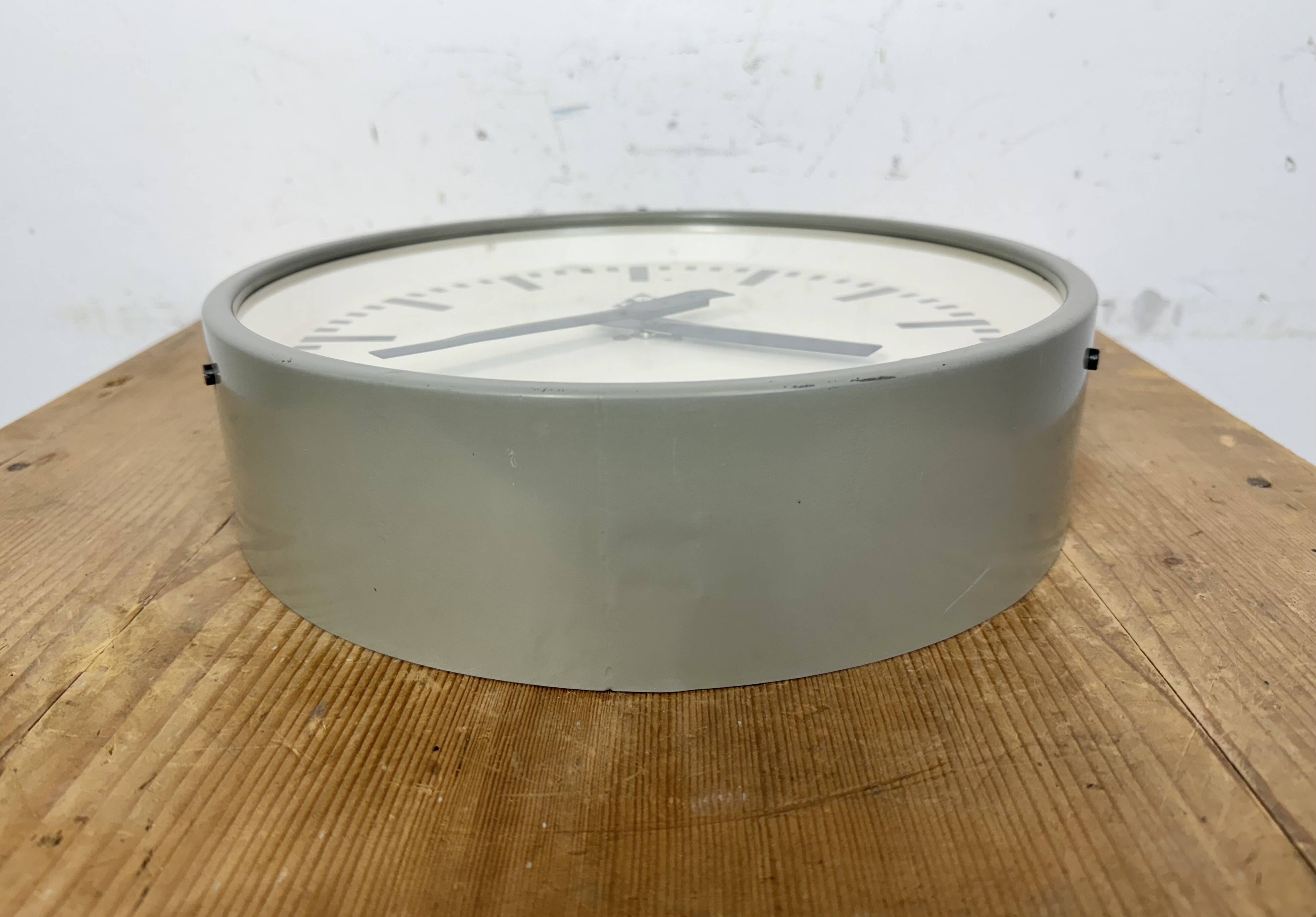 Industrial grey factory wall clock from pragotron, 1960s