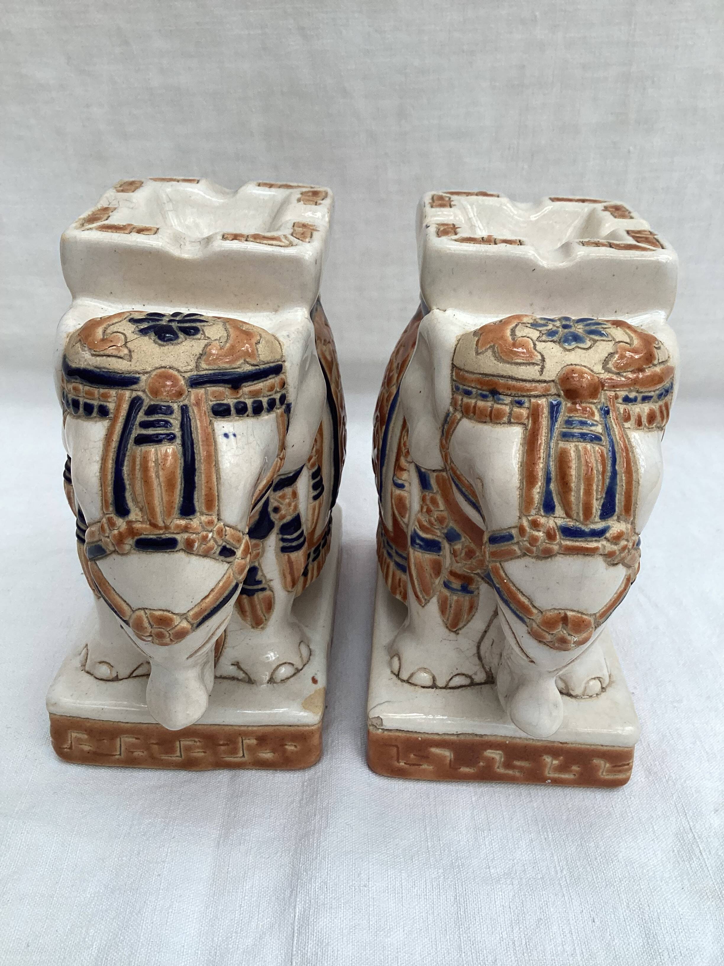 Pair of ceramic elephant ashtrays dimensions: height -14cm- width -13.5cm-