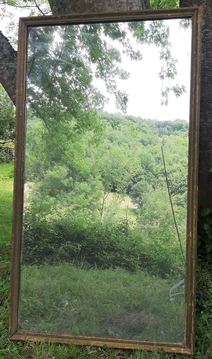 Antique mercury mirror. (Fireplace mirror)