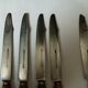 Set of 12 large knives and 11 horn and steel dessert knives