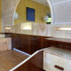 Bed with integrated bedside in rosewood and parchment, art deco period, twentieth century