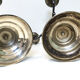 Pair of silver metal candle holders, 1950