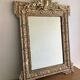 Large gilded patinated Louis XV mirror