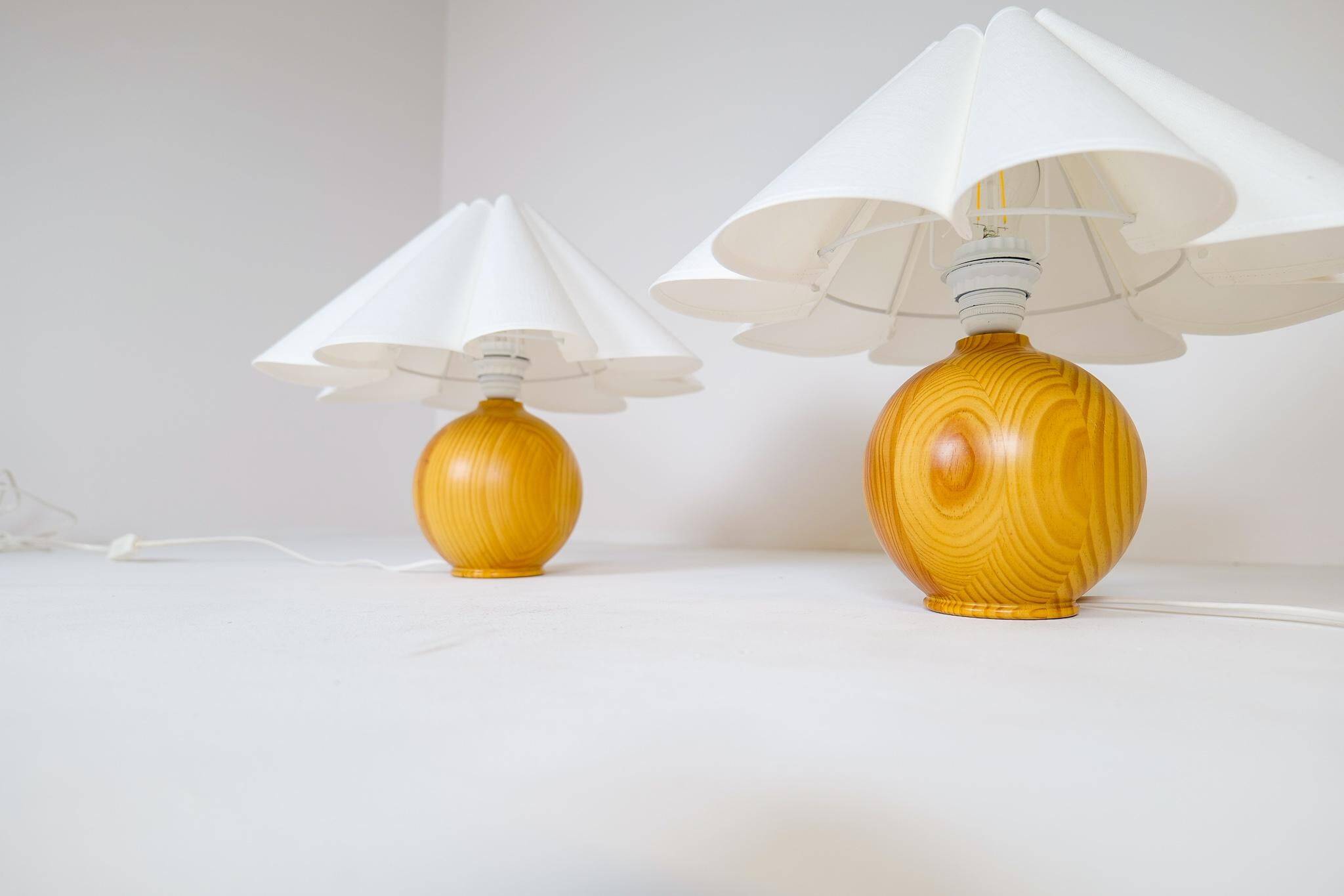 Sculptural modern table lamps from the mid-century in solid pine, Sweden, 1970s.
