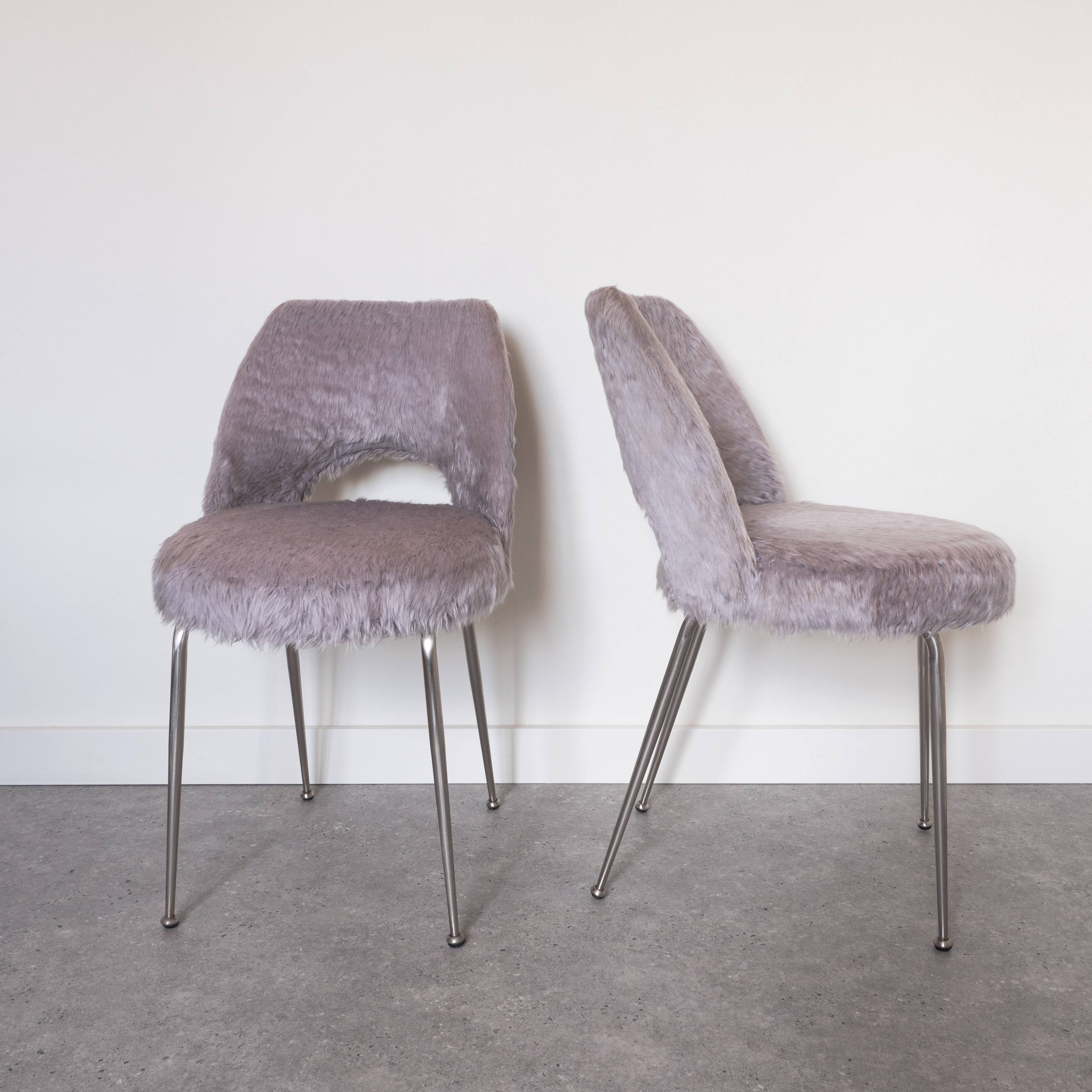 Pair of grey moumoute chairs