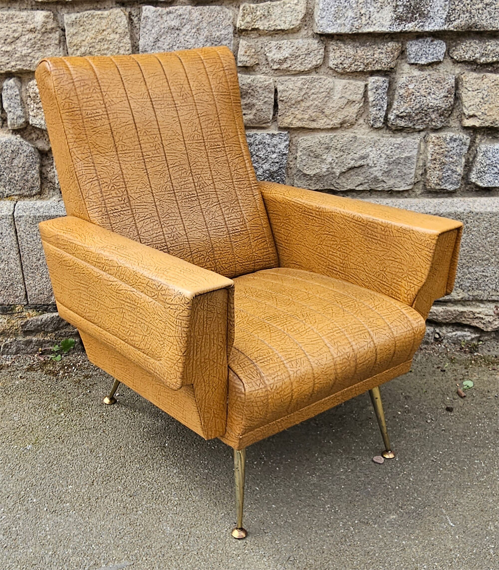 Pair of mustard skaï armchairs, brass feet