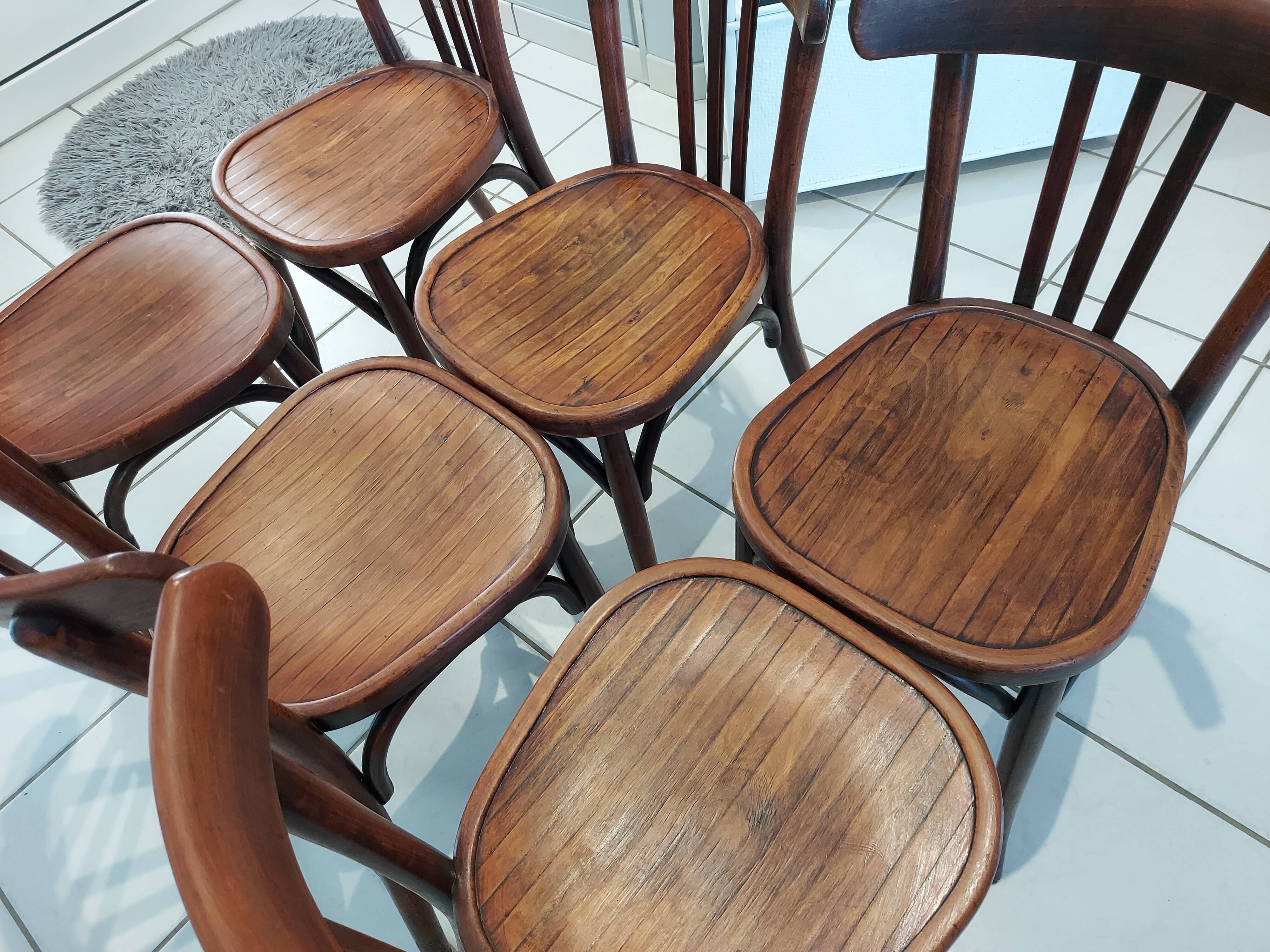 Suite of 12 chairs of bistrot Baumann 1940s