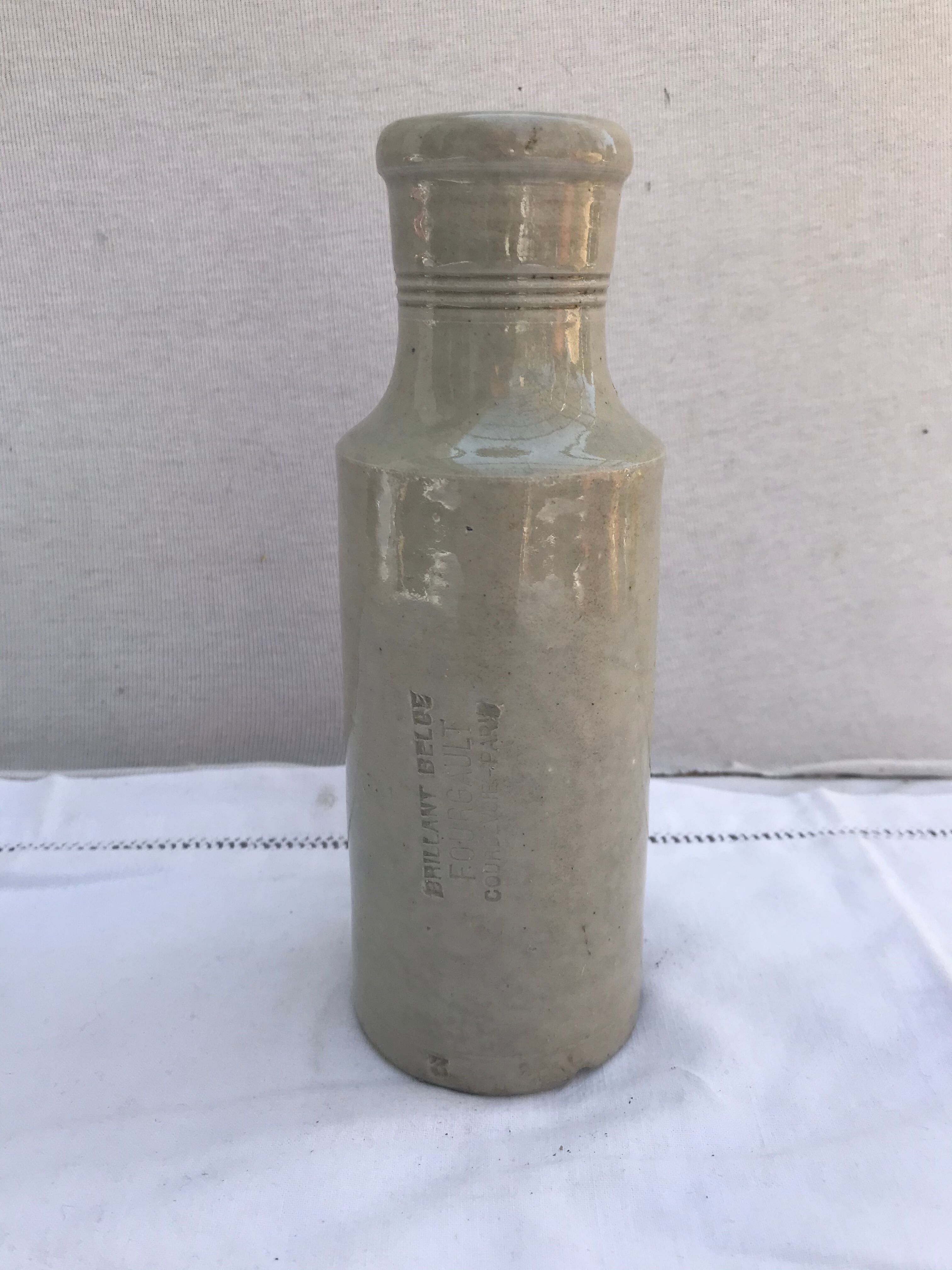 Old ceramic bottle beige Fourgault Courbevoie Paris vintage